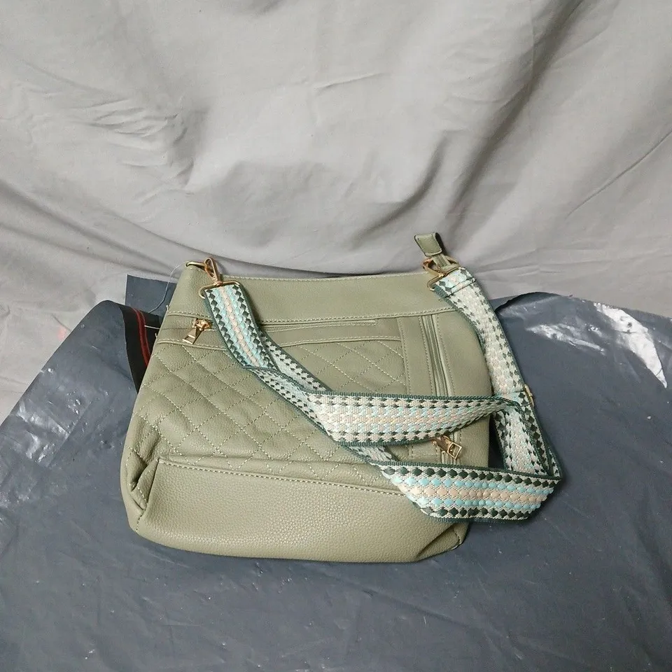 GREEN LEATHER BAG WITH PATTERN CARRY HANDLE