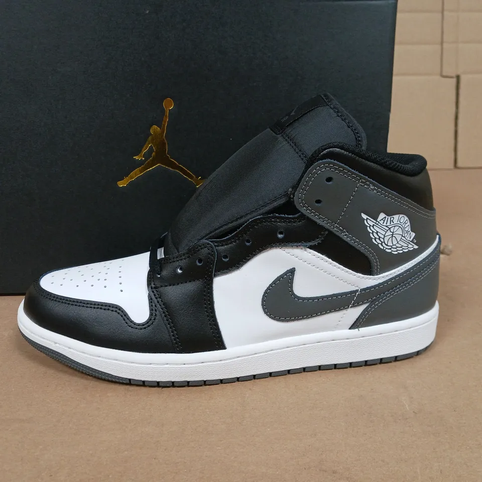 BOXED PAIR OF AIR JORDAN 1 MID TRAINERS IN BLACK/WHITE - UK 8.5