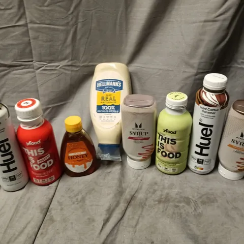 APPROXIMATELY 12 ASSORTED FOOD & DRINK ITEMS TO INCLUDE HELLMANS MAYONAISE, HUEL ICED COFFEE CARAMEL, MYPROTEIN SYRUP, ETC - COLLECTION ONLY