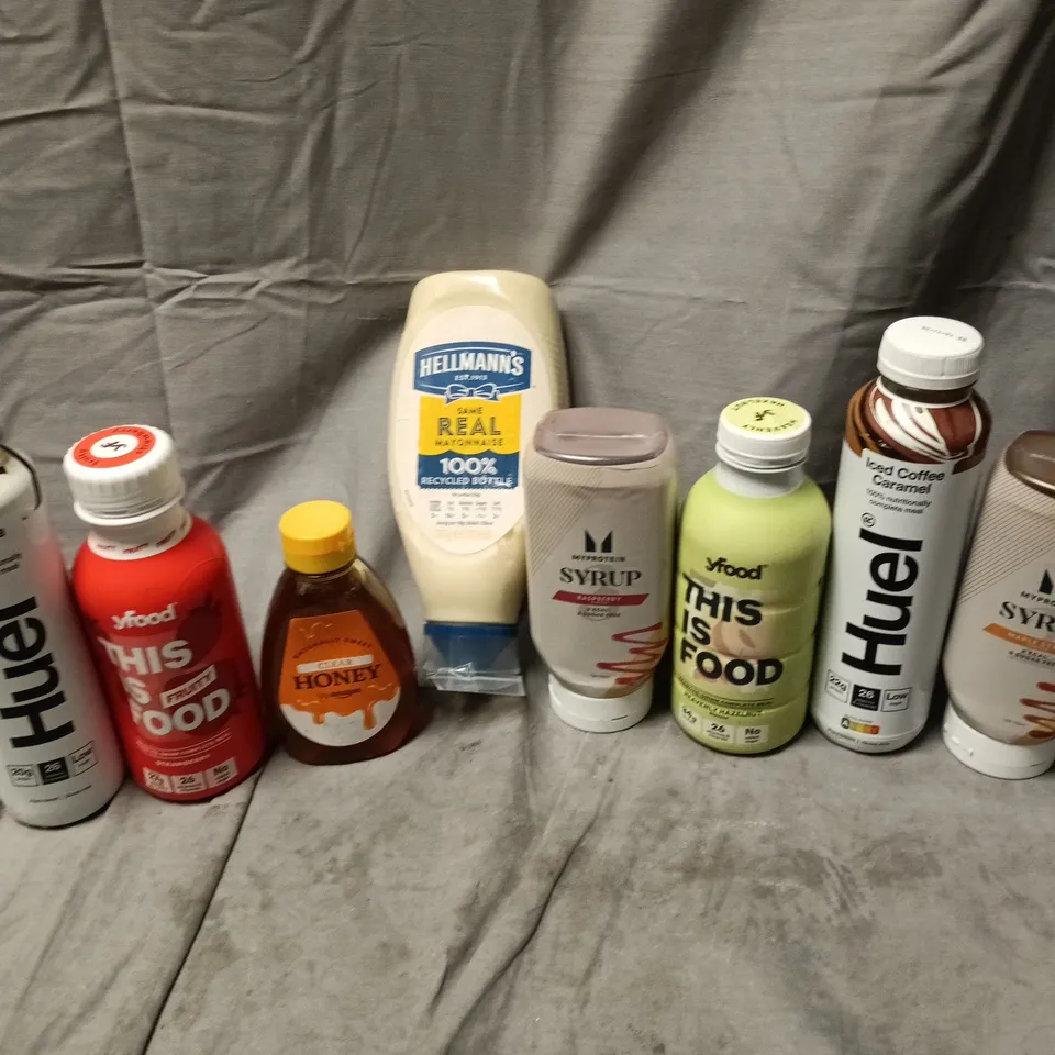 APPROXIMATELY 12 ASSORTED FOOD & DRINK ITEMS TO INCLUDE HELLMANS MAYONAISE, HUEL ICED COFFEE CARAMEL, MYPROTEIN SYRUP, ETC - COLLECTION ONLY