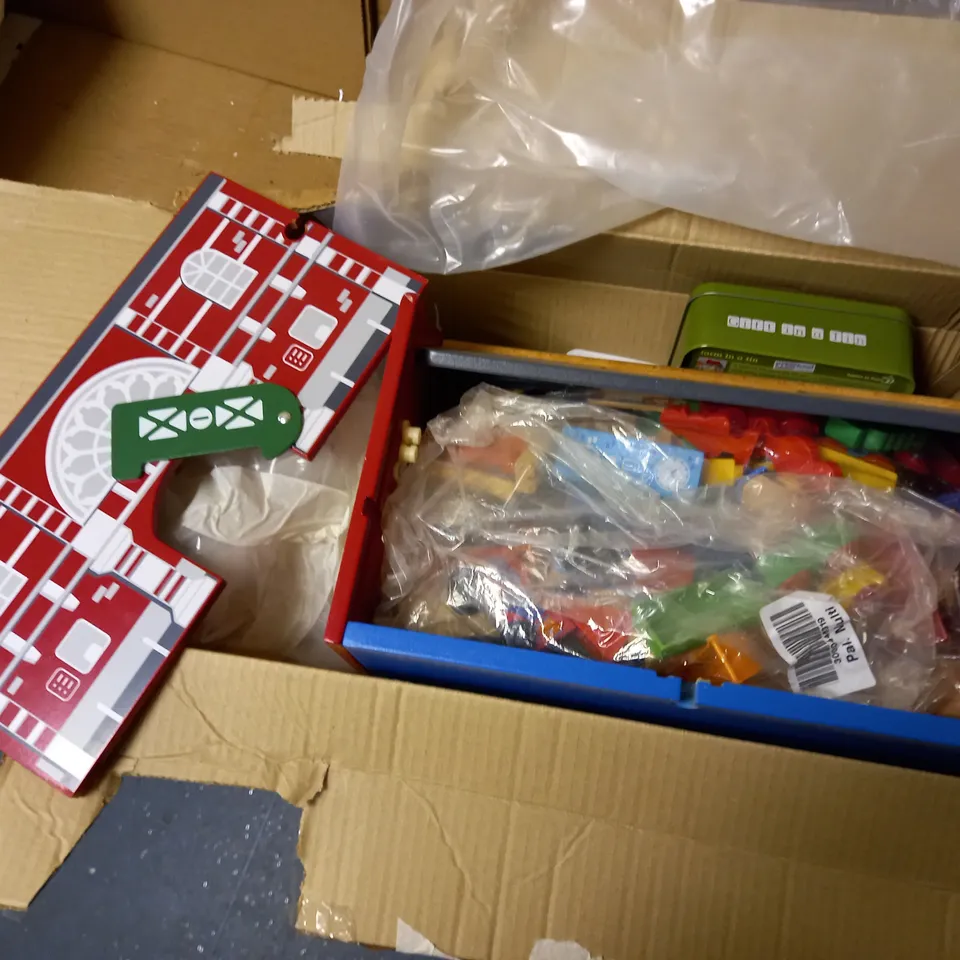 BOX OF ASSORTED TRAINS AND TRACKS SETS WITH PROPS