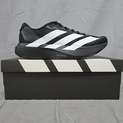 BOXED PAIR OF ADIDAS ADIZERO EVO SL SHOES IN BLACK/WHITE SIZE UK 11