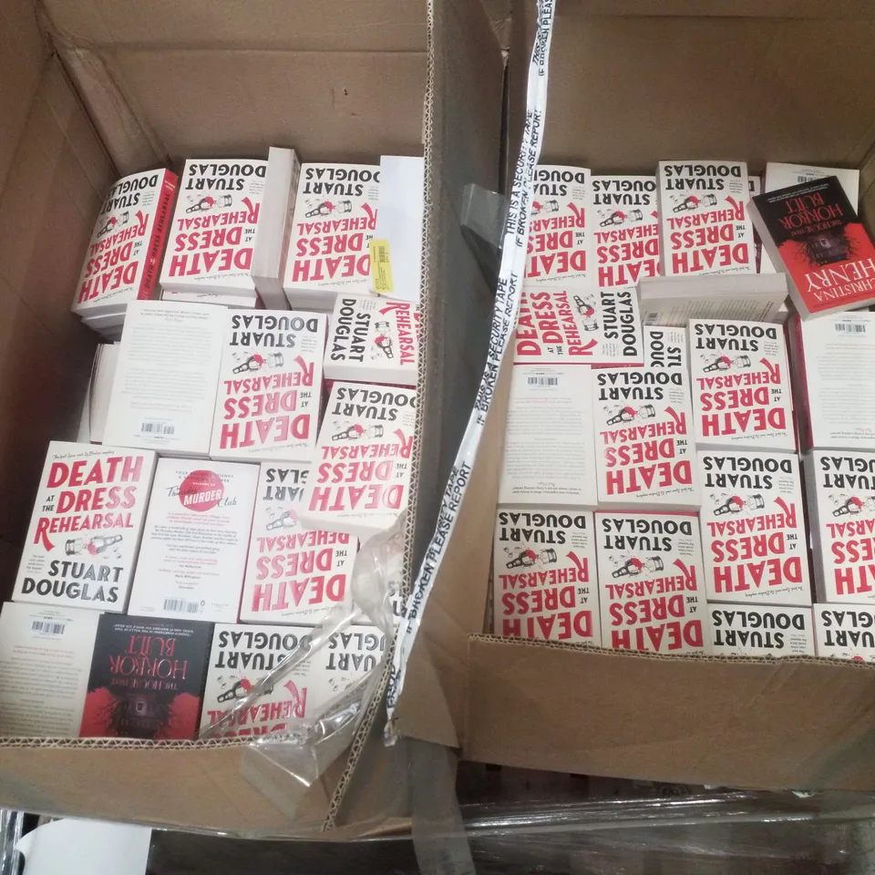 PALLET CONTAINING LARGE QUANTITY OF BOOKS INCLUDING DEATH AT THE DRESS REHEARSAL BY STUART DOUGLAS & THE HOUSE THAT HORROR BUILT BY CHRISTINA HENRY