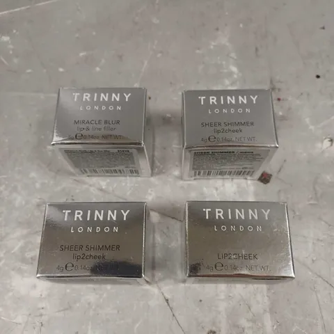 TRINNY LONDON LOT OF APPROXIMATELY 4 ASSORTED COSMETIC PRODUCTS TO INCLUDE - MIRACLE BLUR LIP & LINE FILLER - LIP2CHEEK IN LADY J - SHEER SHIMMER IN VIOLIN - ETC