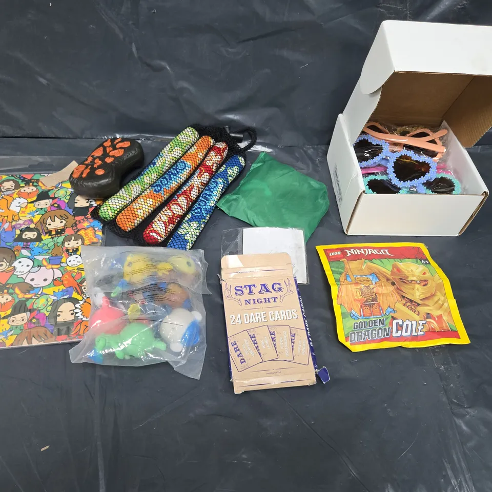 TOTE OF ASSORTED TOYS AND ACCESSORIES TO INCLUDE; HARRY POTTER GIFT WRAP, STAG NIGHT DARE CARDS, NOVELTY GLASSES AND NICE CUBE