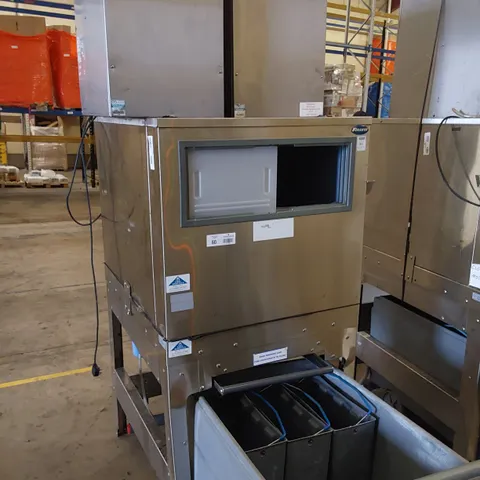 FOLLETT COMMERCIAL ICE MACHINE ON STAND WITH ICE TROLLEY