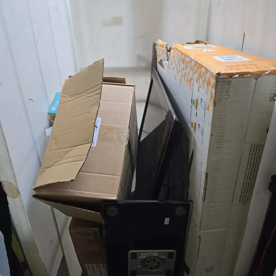 CAGE OF APPROXIMATELY 25 ASSORTED ITEMS INCLUDING SAMASUNG TV , INK CARTRIDGES AND TP LINK POWER STARTER KIT 