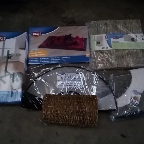 PALLET OF 2 BOXES CONTAINING ASSORTED TRIXIE PET SUPPLIES INCLUDING DOG CONE, PET BEDS, GRASS HOUSE, BAR FOR DOGS, STRATEGY GAME 