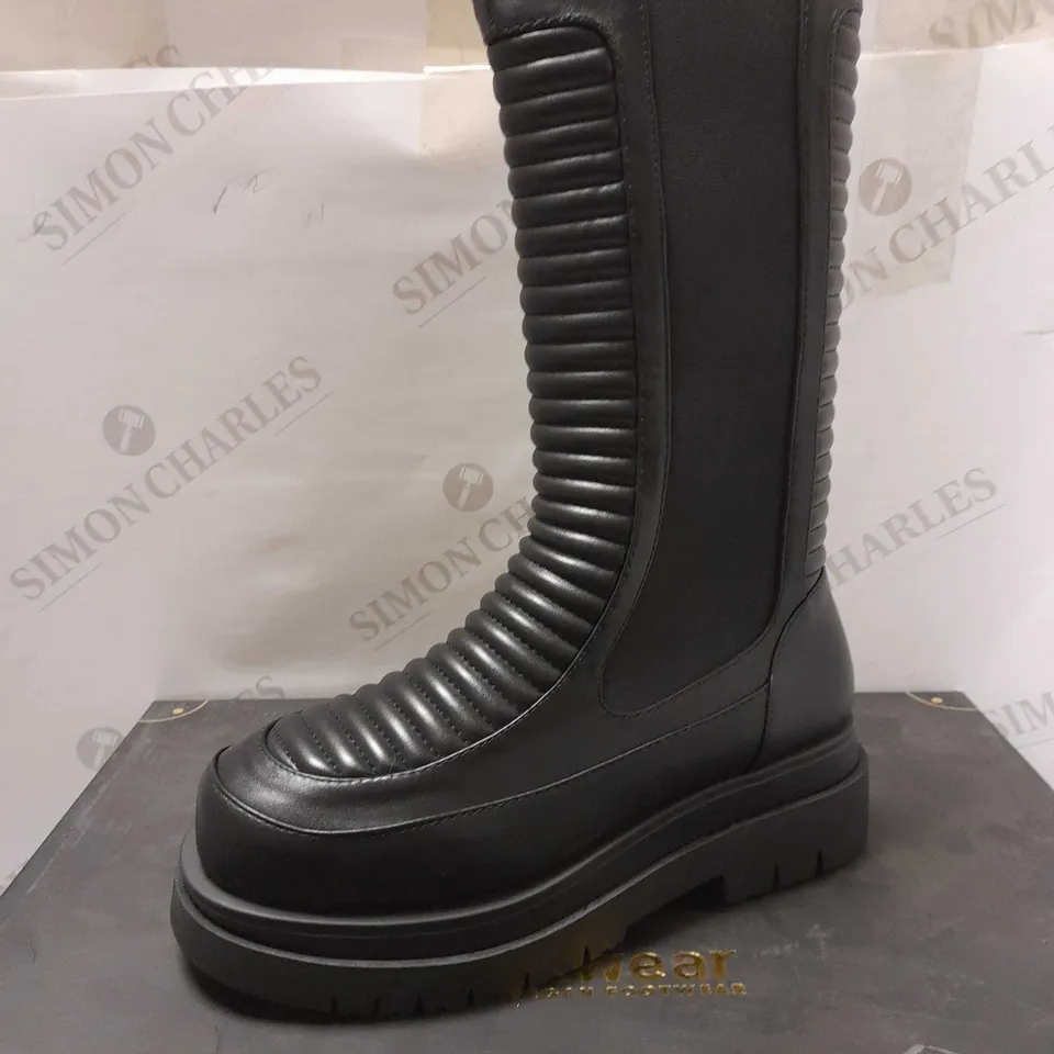 KOI THE HARDY LONG PADDED BLACK PU BOOTS - SIZE 7