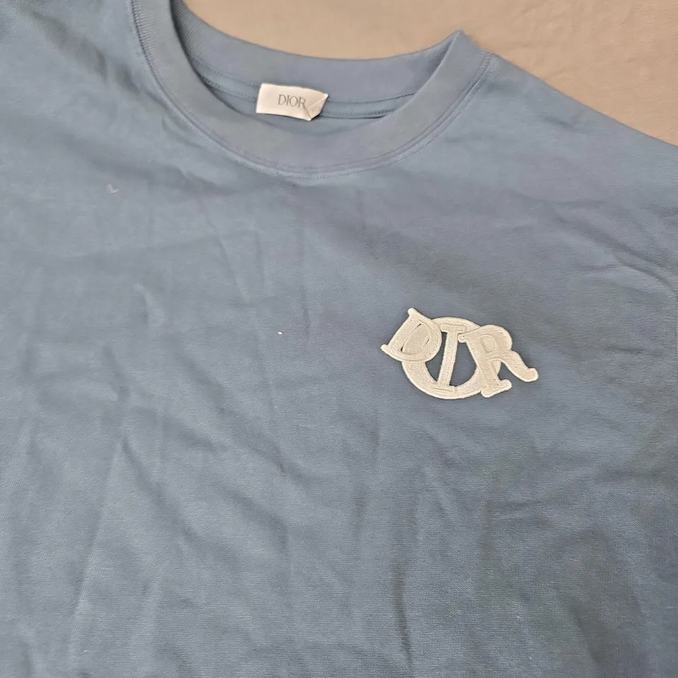 DIOR BLUE T‑SHIRT WITH WHITE EMBROIDERED LOGO PATCH - SIZE UNSPECIFIED