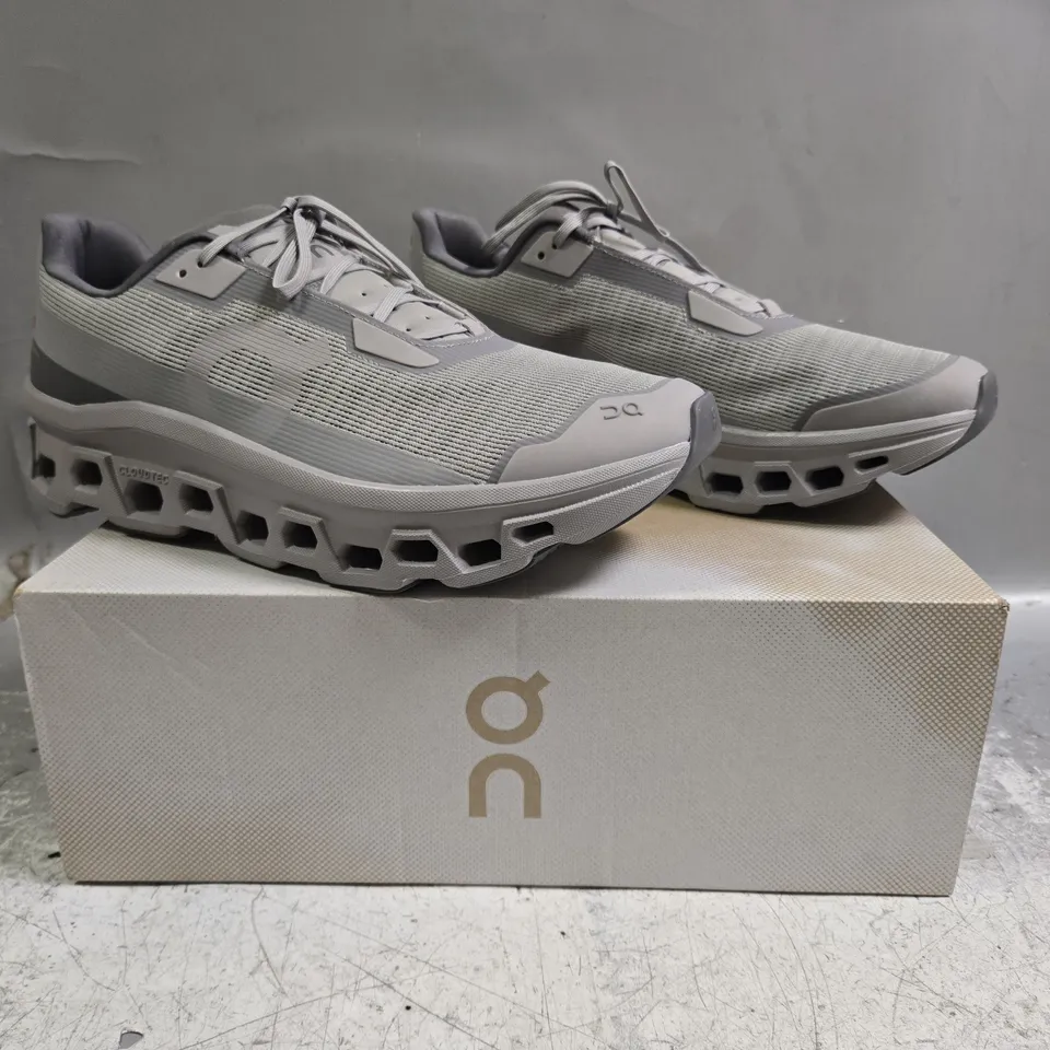BOXED PAIR OF ON CLOUDMONSTER VOID SHOES IN ALLOY/GLACIER SIZE UK 12