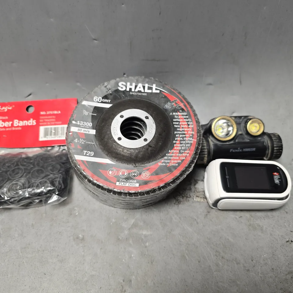 APPROXIMATELY 12 ASSORTED ITEMS TO INCLUDE - RUBBER BANDS IN BLACK , FENIX HM65R LIGHT ETC