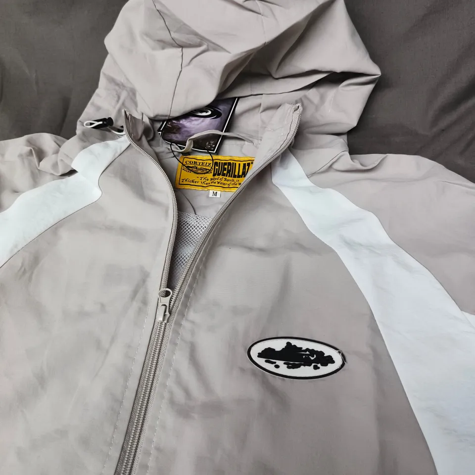 BAGGED CORTEIZ WINDBREAKER JACKET - SIZE M