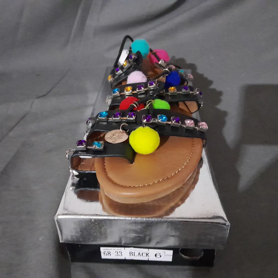 APPROXIMATELY 10 PAIRS OF BOXED KELSI BLACK FAUX LEATHER FLAT TIE UP SANDLES