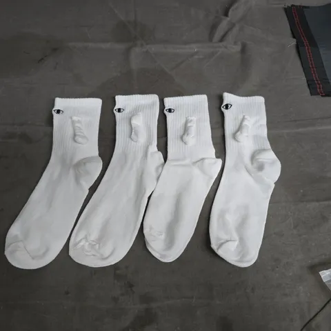 WHITE CREW SOCKS WITH SMALL BLACK EYE LOGO – SET OF 4