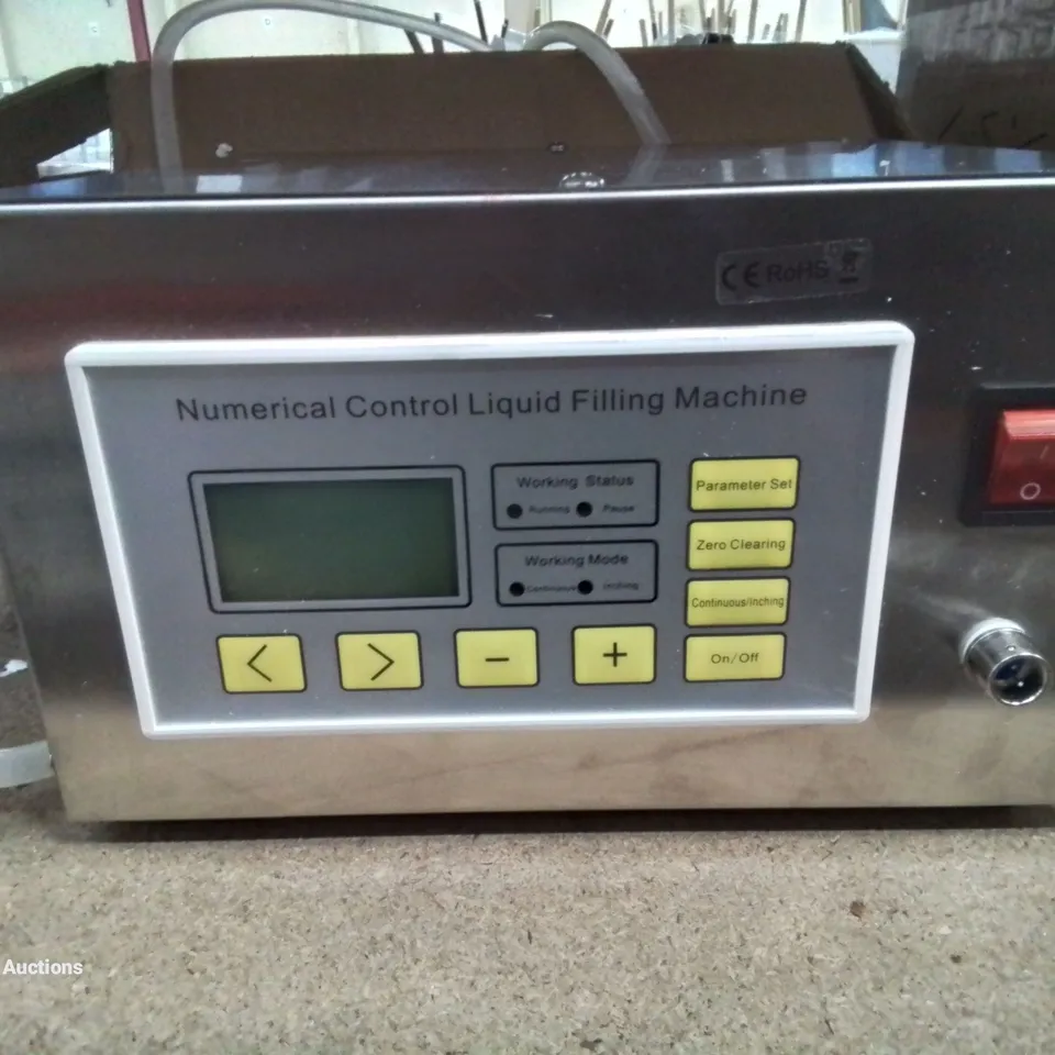 A BOXED NUMERICAL CONTROL LIQUID FILLING MACHINE
