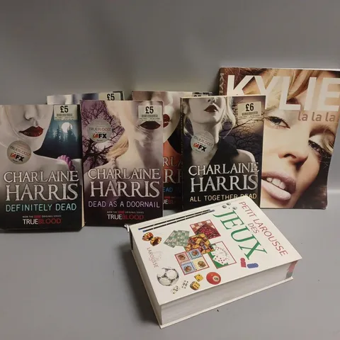 7 ASSORTED BOOKS TO INCLUDE KYLIE LA LA LA AND LIVING DEAD IN DALLAS BY CHARLAINE HARRIS 