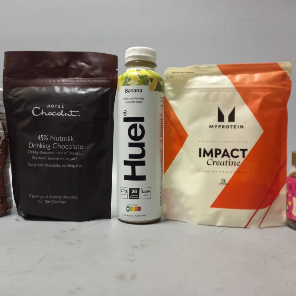 TOTE OF APPROX 10 ASSORTED FOOD ITEMS TO INCLUDE - MYPROTEIN IMPACT CREATINE , HUEL BANANA , HOTEL CHOCOLAT 45% NUTMILK DRINKING CHOCOLATE ETC