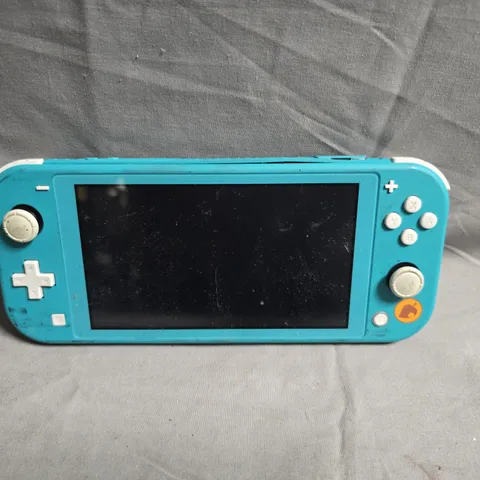 NINTENDO SWITCH LITE HANDHELD CONSOLE – TURQUOISE
