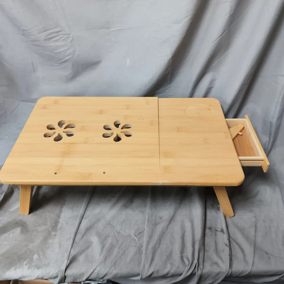 LIGHT WOOD ORIENTAL STYLE SMALL TABLE WITH DRAWER AND DECORATIVE FLOWER CUTOUTS. UNBOXED