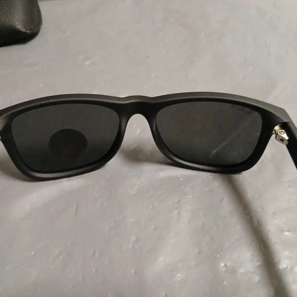 BOXED PAIR OF RAY BAN POLARISED BLACK FRAMED GLASSES