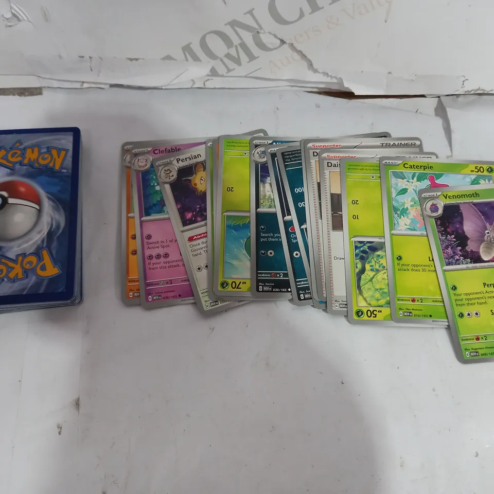 BOX OF APPROX 30 COLLECTABLE POKEMON TRADING CARDS