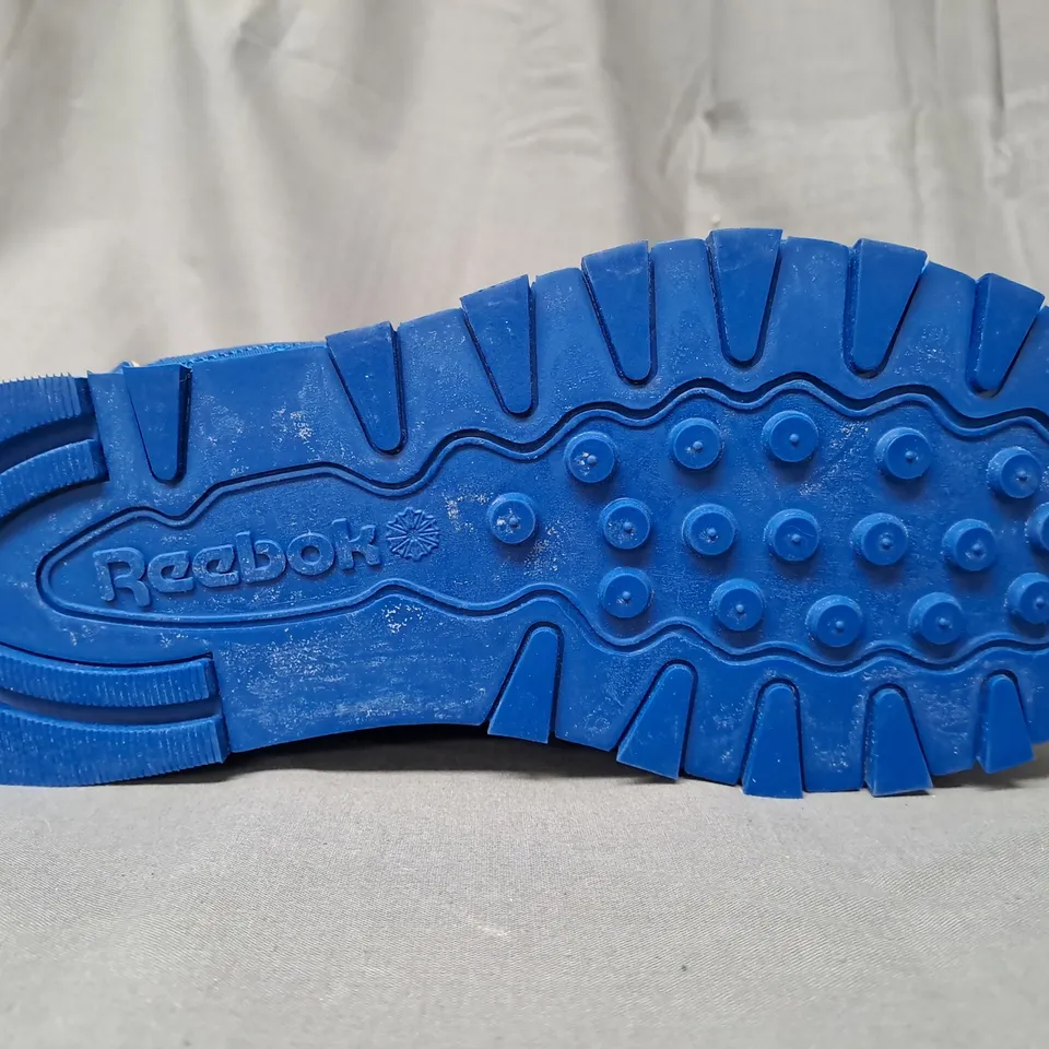 PAIR OF REEBOK TRAINERS IN BLUE UK SIZE 7