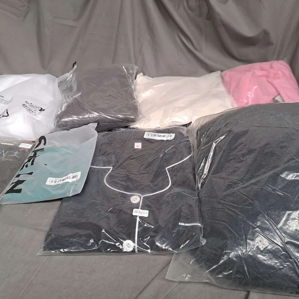 LARGE QAUNTIITY OF ASSORTED CLOTHING ITEMS IN VARIOUS STYLES, SIZES AND COLOURS