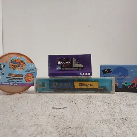 APPROXIMATELY 10 ASSORTED TOYS AND GAMES TO INCLUDE RAINBOW MYSTERY DUMPLING, ETC