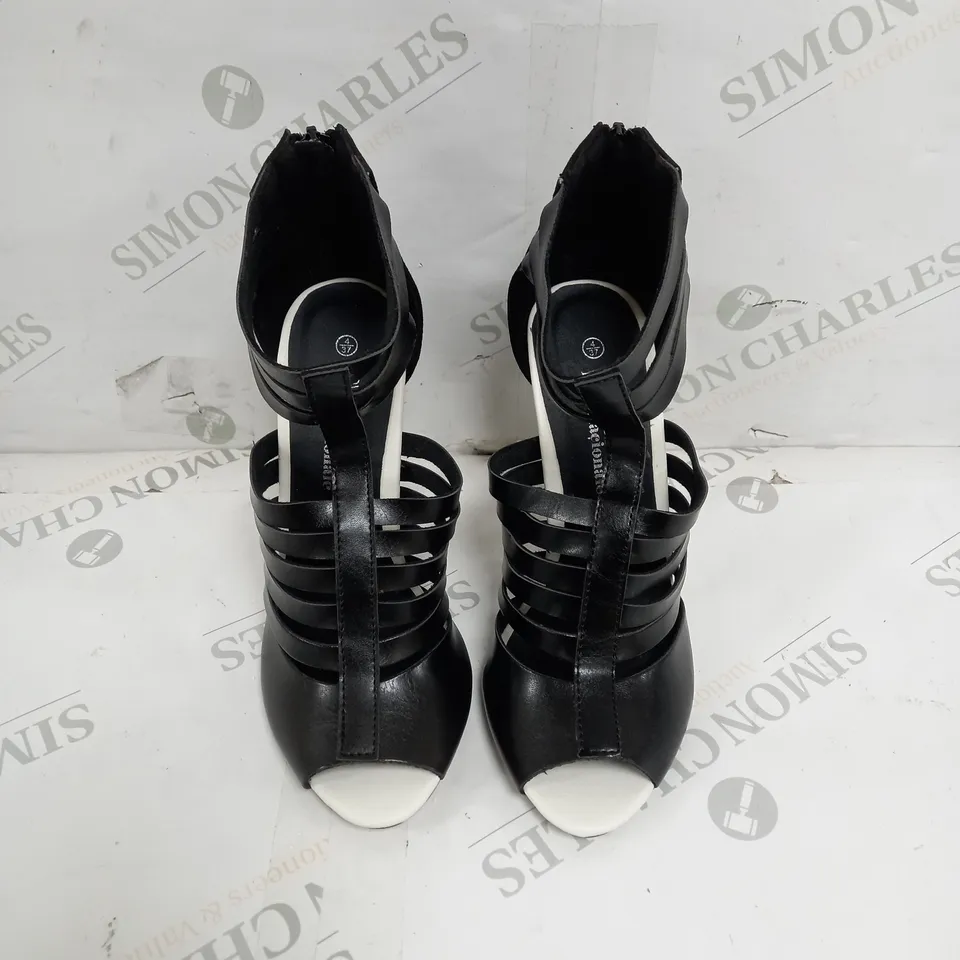 APPROXIMATELY 12 PAIRS OF LOVE SHOES BY INTERNACIONALE SAFFI BLOCK HEELED GLADIATOR SANDALS IN BLACK SIZE 4