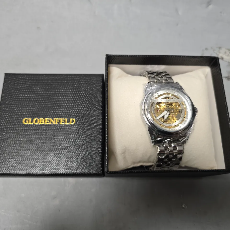 BOXED GLOBENFIELD EXHIBITION DIAL GENTS WATCH WITH SKELETON BACK CASE AND METAL STRAP