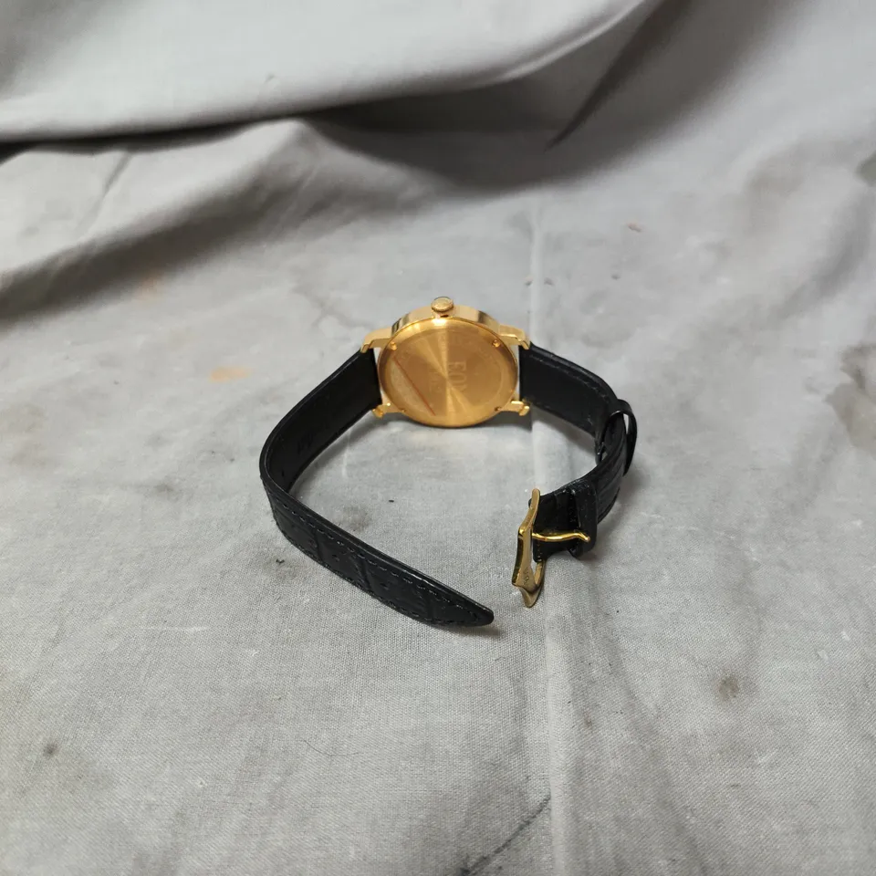 EON GOLD-TONE WRISTWATCH WITH BLACK LEATHER STRAP – BOXED