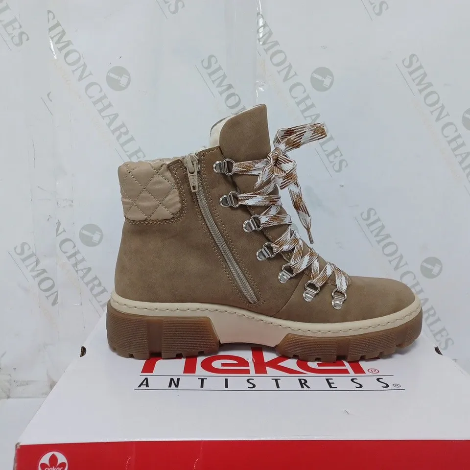 BOXED PAIR OF RIEKER LACE UP CHUNKY BOOTS IN CREAM SIZE 6