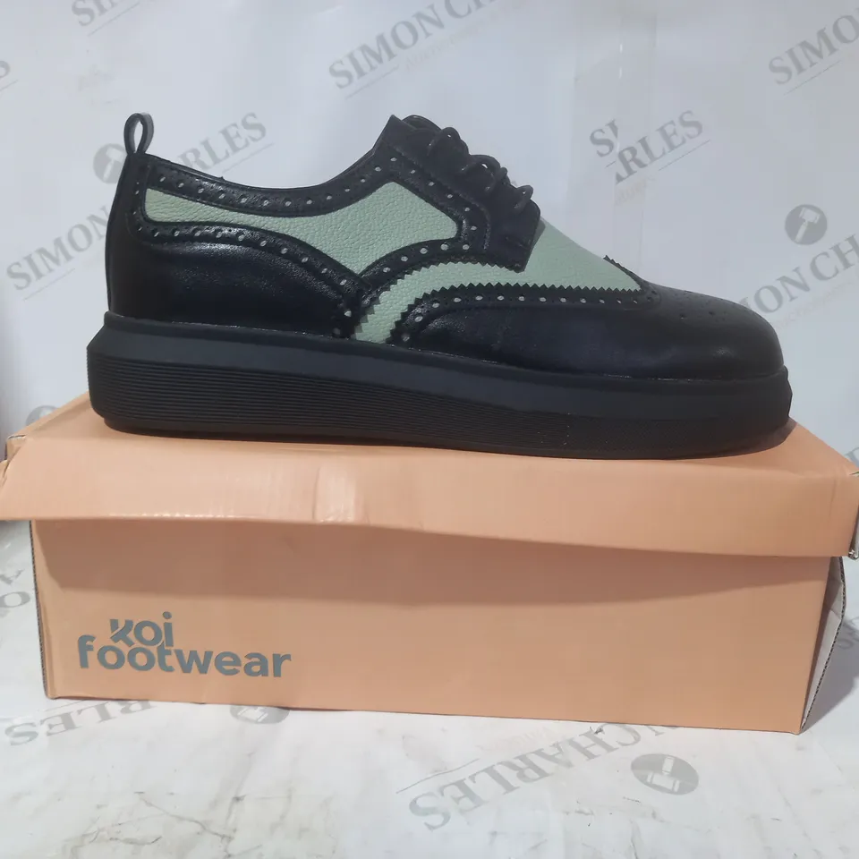 BRAND NEW BOXED PAIR OF KOI VEGAN LEATHER CORSON GREEN BROGUE DETAIL TRAINERS IN BLACK UK SIZE 8