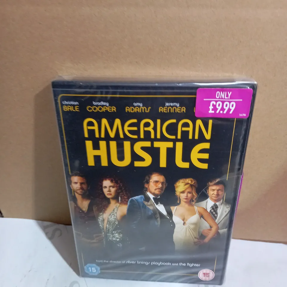 LOT OF APPROXIMATELY 50 DVDS TO INCLUDE THE INBETWEENERS 2 AND AMERICAN HUSSLE