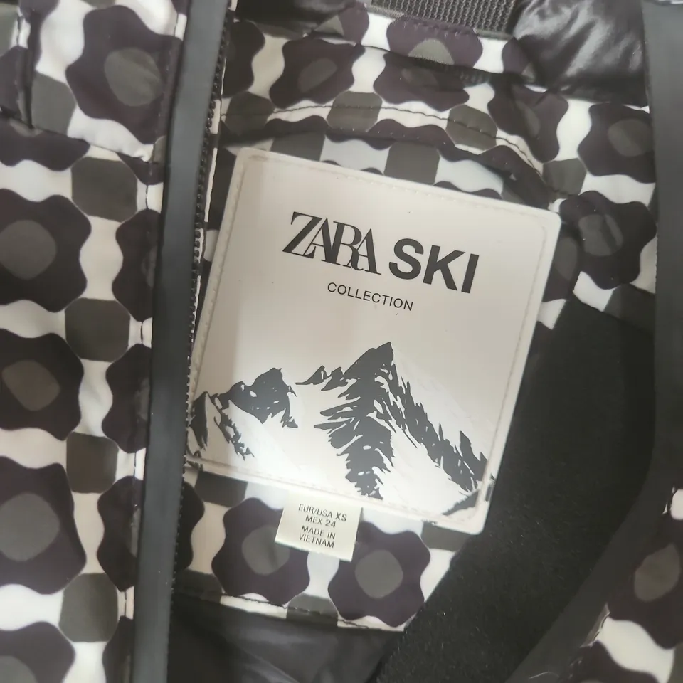 ZARA SKI COLLECTION COAT IN PATTERNED GREEN/BLACK/WHITE- XS