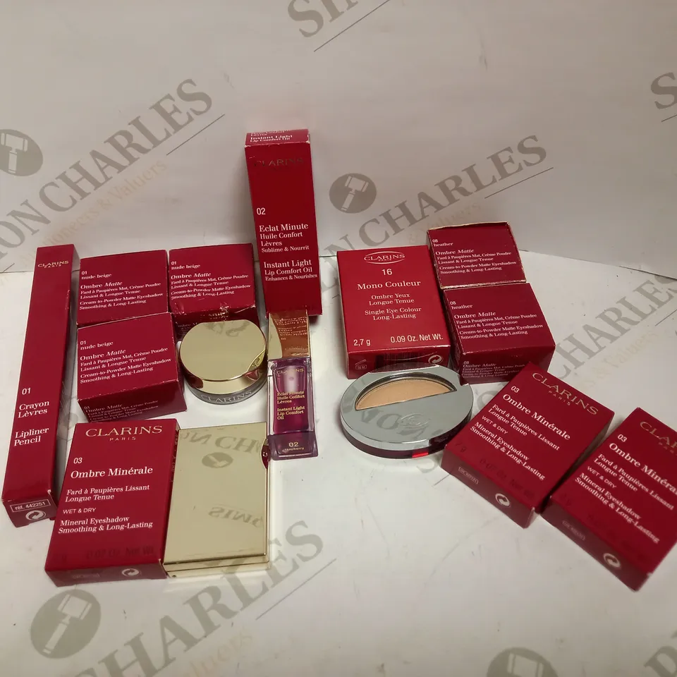 LOT OF APPROX 10 TO INCLUDE CLARINS MATTE EYESHADOW , CLARINS INSTANT LIGHT LIP OIL , ETC