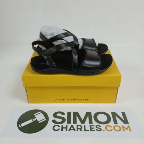 BOXED PAIR OF STRIVE CORAL LADIES BLACK SANDALS - UK 7