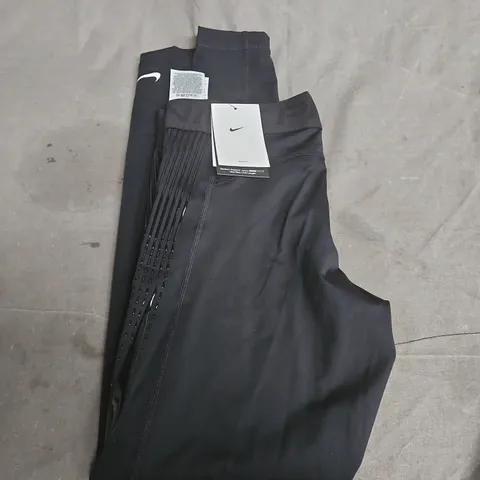 WOMENS NIKE LEGGINGS - SIZE M