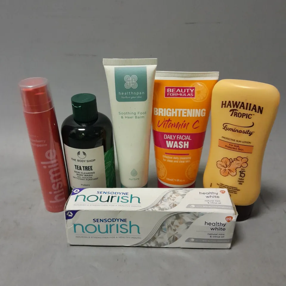 APPROXIMATELY 20 ASSORTED COSMETIC PRODUCTS INCLUDE - SENSODYNE NOURISH TOOTHPASTE - THE BODY SHOP TEA TREE BODY WASH - HEALTHSPAN FOOT BALM