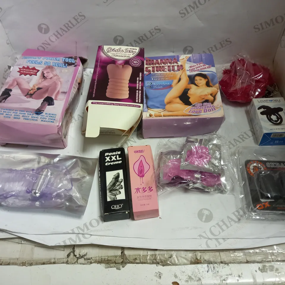 LOT OF APPROX 10 ASSORTED ADULT ITEMS TO INCLUDE BLOWUP DOLL, STRAPON SET, MALE MASTURBATOR ETC