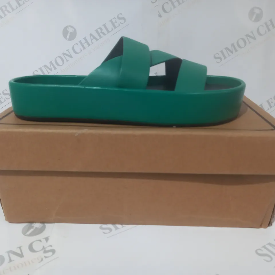 BOXED PAIR OF ASOS DESIGN OPEN TOE LEATHER FLAT MULES IN GREEN UK SIZE 6