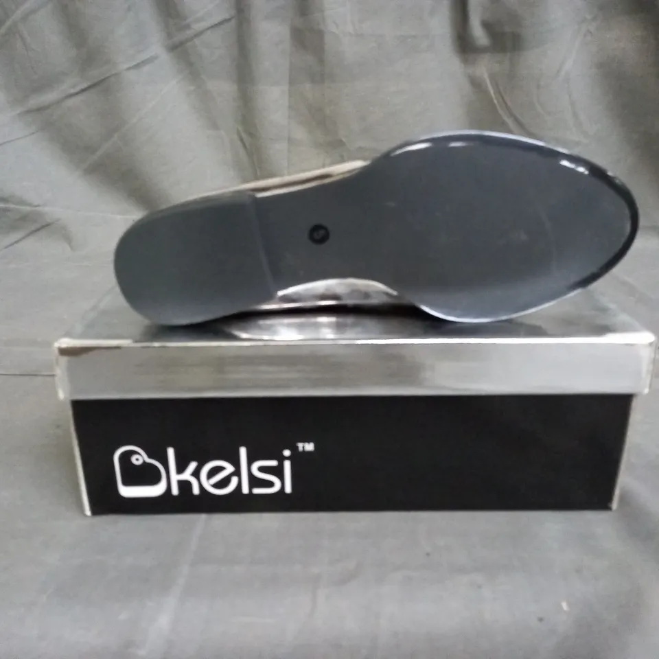 APPROXIMATELY 12 BOXED PAIR OF KELSI SLIVER FAUX PATENT LEATHER SHOES IN VARIOUS SIZES TO INCLUDE SIZE 5 