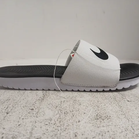BOXED PAIR OF NIKE KAWA SLIDES IN WHITE/BLACK SIZE UK 5.5