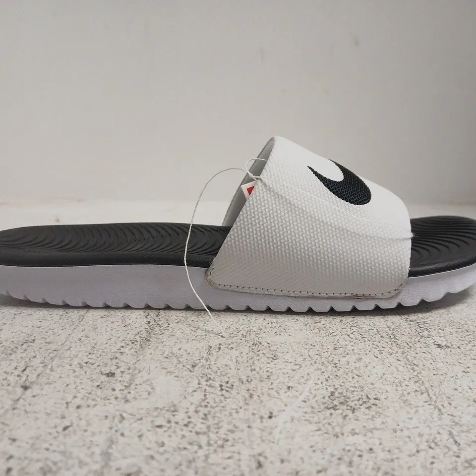 BOXED PAIR OF NIKE KAWA SLIDES IN WHITE/BLACK SIZE UK 5.5