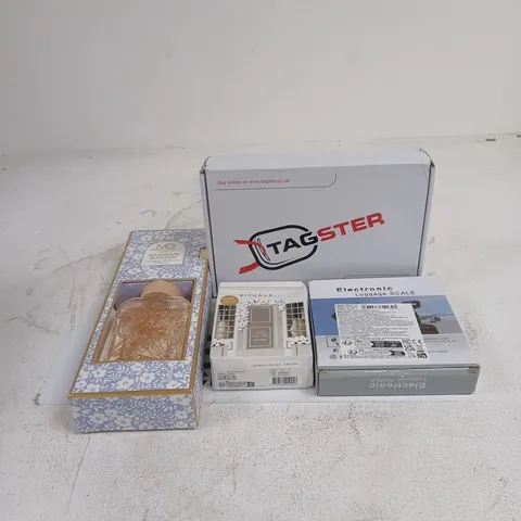 TOTE OF APPROXIMATELY 12 ASSORTED ITEMS TO INCLUDE TAGSTER YELLOW TAGS, ELECTRONIC LUGGAGE SCALE, MAGNOLIA BLOSSOM DIFFUSER, RITUALS... HOME PERFUME ETC