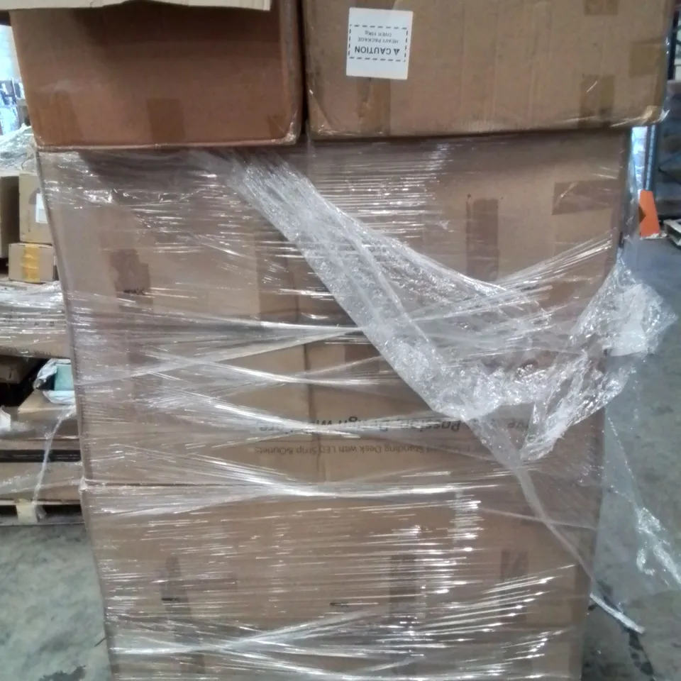 PALLET CONTAINING LARGE QUANTITY OF WRITING DESKS