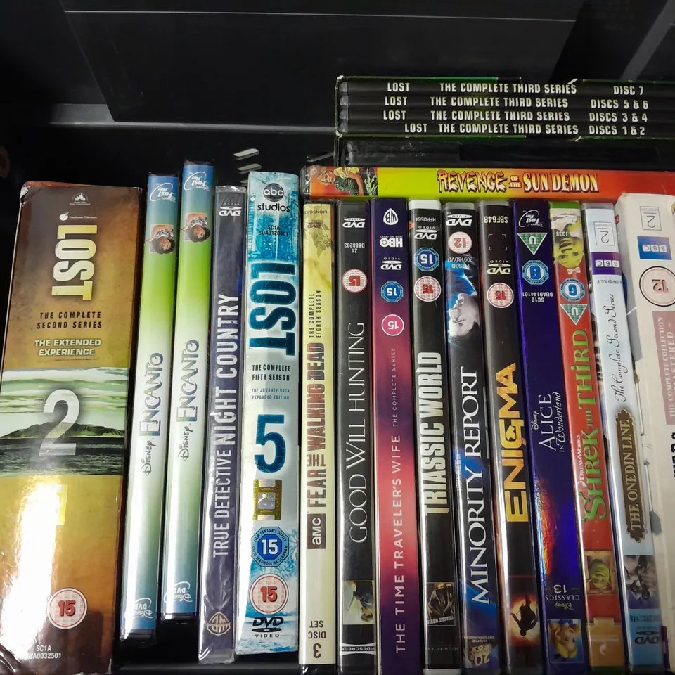 BOX OF APPROXIMATELY 15 DVDS TO INCLUDE - PAUL ZERDIN NO STRINGS , LOST 4 , STAR WARS OBI WAN KENOBI ETC