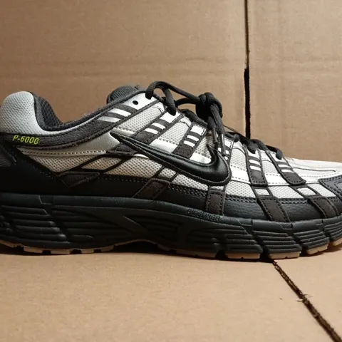 PAIR OF NIKE P-6000 TRAINERS IN GREY/SILVER/BLACK SIZE UK 11