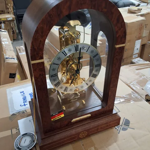 HERMLE MECHANICAL TABLE CLOCK WITH ARCHED WALNUT CASING AND HOUR STRIKE 30CM X 19CM X 13.5CM